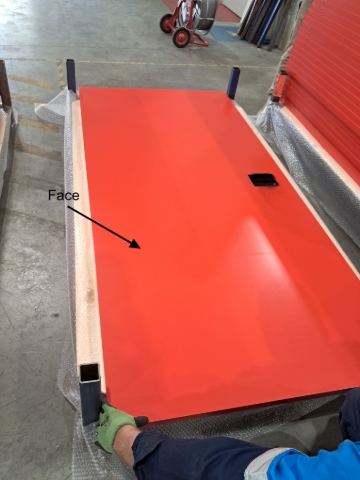 <p>Place the first door down, face up. Ensure there is a gap between the door and the stillage leg.</p>