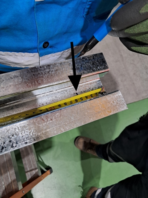 <p>Measure 50mm from the bottom and top and put a mark, this is where you'll place your screws.</p>