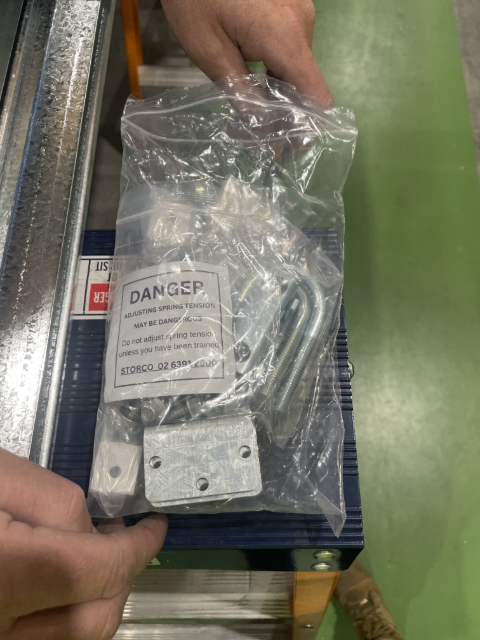 <p>Open your roller door kit.</p>