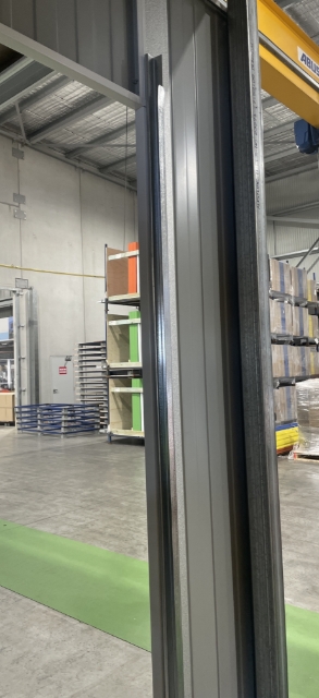 <p>Using a tape measure, measure the length of the door from the lock side track to the other side for the correct track placement.</p><p>If the guide shows from the outside, contact a Storco Representative.</p>
