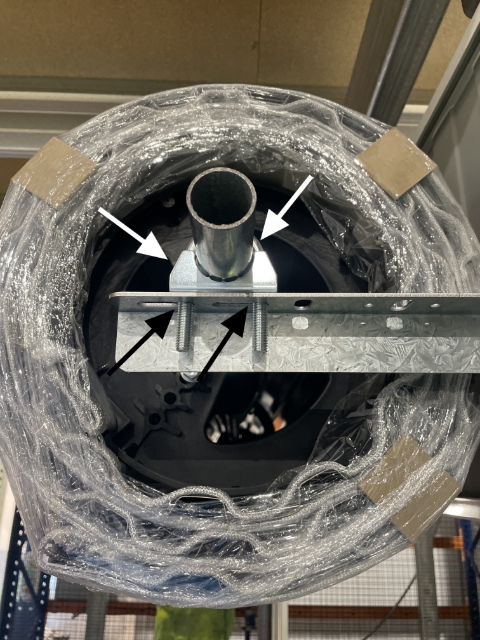 <p>Once door is up, using your U-bolt kit, place the cradle under the shaft and the U-bolt over the top of the shaft.</p><p>Move the shaft to the front of the holes towards the front of the unit.</p><p>Don't tighten yet!</p>