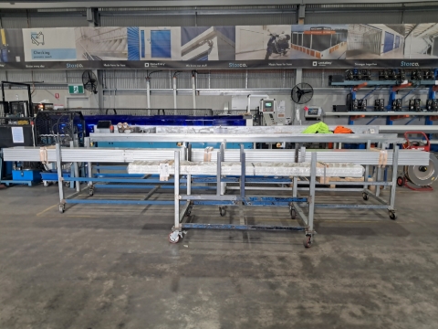 <p>Get your trolley.</p><p>Depending on the size of the product, depends on which trolley you get. 3 metres and bigger use the big trolley. 3 metres and smaller, use the small trolley.</p>