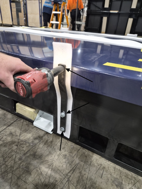 <p>Remove the metal brackets using the rattle gun.</p>