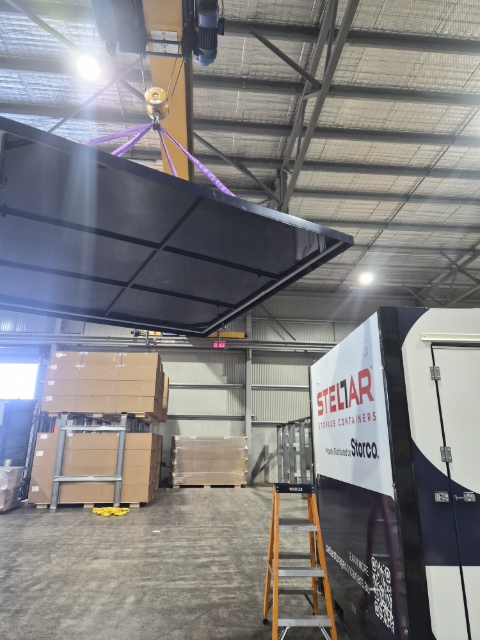 <p>Carefully lift the roof up and over to the container.</p>