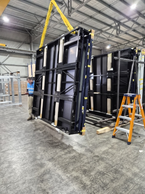 <p>Slowly remove the container from frame.</p>