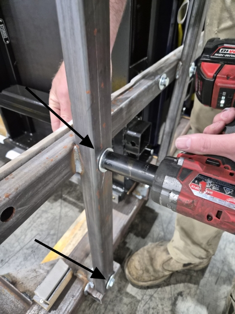 <p>Using the rattle gun, undo the frame bolts.</p>