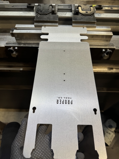 <p>1) burr side down with straight side in first </p>