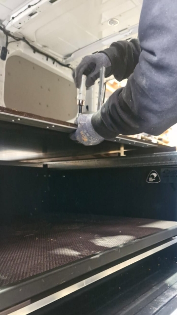 <p>Fit the alloy bar to the main false floor.</p>