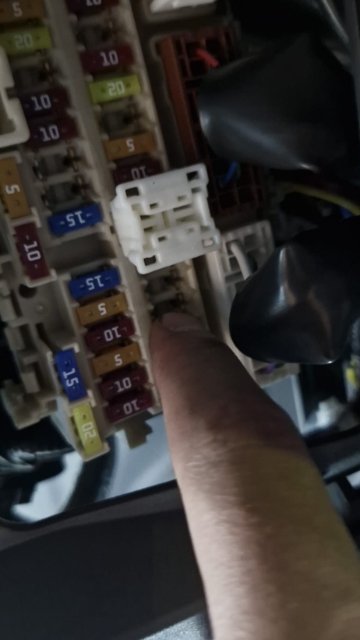 <p>Remove the 10amp fuse from the spot shown.</p>