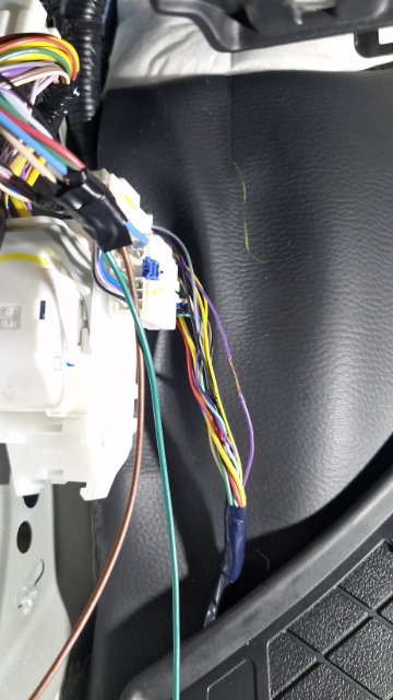 <p>Locate the Purple wire at the front of the vehicle by the kick panel. Ensure to test the right wire for the door ajar alarm and strip 10mm.</p>