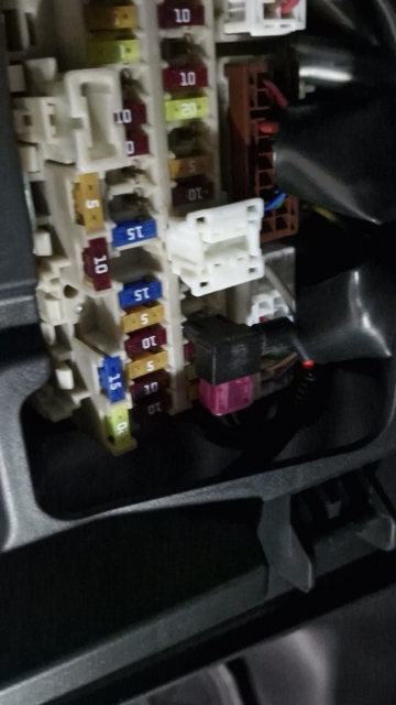 <p>Fit the fuse holder with two 10-amp fuses into the spot where the 10-amp factory fuse was.</p>