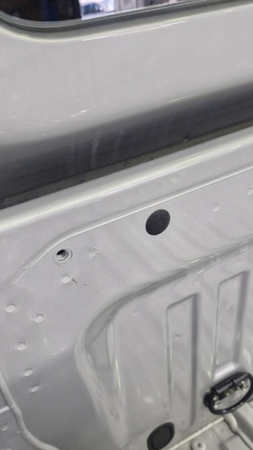 <p>Remove the factory plastic hole plugs from the front (cab-end) of the wellside. </p>
