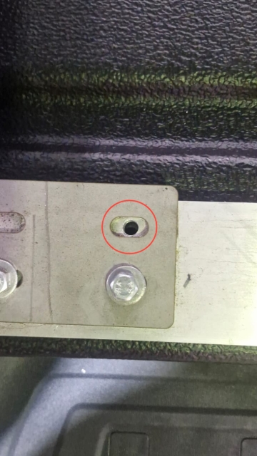 <p>Drill an 8.5mm hole through the flat bar and the liner and make a mark on the van floor. </p>
