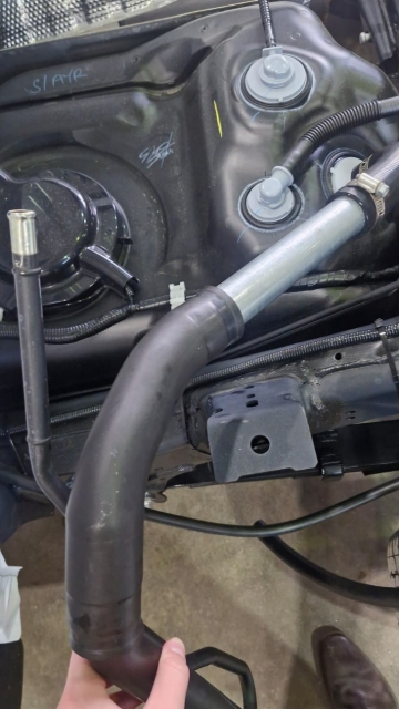 <p>Use the original fuel hose to attach to the top of the steel pipe</p>