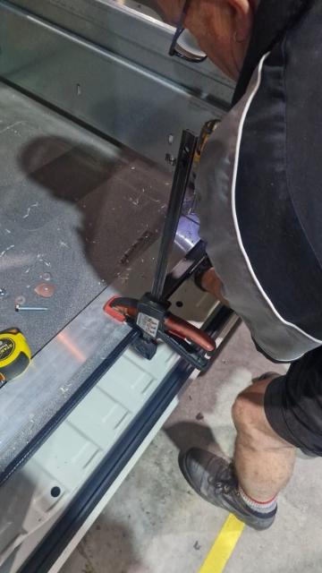 <p>Tighten the 4 bolts for the drawer carcass to be secure to the floor of the van.</p>