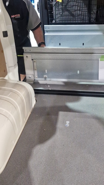 <p>Lift the carcass into the van.</p>