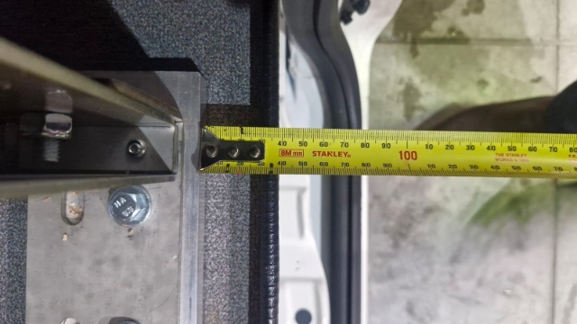 <p>Measure from the end of the drawer carcass to the end of the floor. Make sure it is the same measurement on both sides.</p>