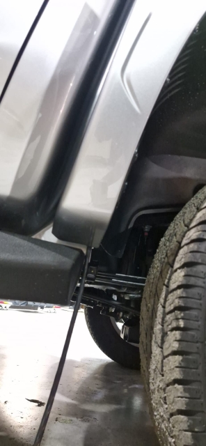 <p>Run the wire along the chassis ensure it sits along the top so it can't drag on the ground</p>
