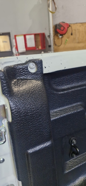 <p>Remove the factory bolt.</p>