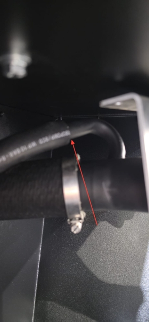 <p>Fit the new breather hose to the fuel filler funnel</p>
