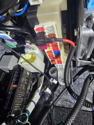 <p>Locate the fuse box underneath. Use the next step to find which fuse spot to use.</p>