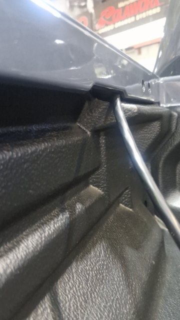 <p>Route the wiring up behind the liner and then down the wellside pulling it out the bottom.</p>