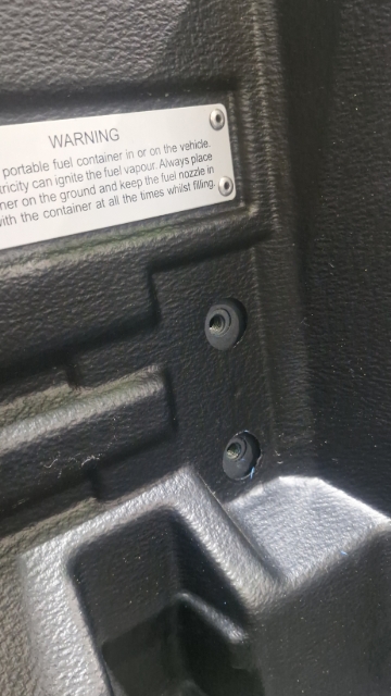 <p>Remove the tie downs at the rear of the wellside.</p>
