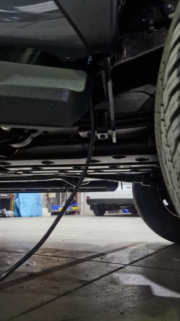 <p>Pull the loom down along the top of the chassis to prevent it from being ruined if it scraped on the ground.</p>
