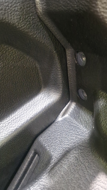 <p>Remove the tie-downs points at the front of the wellside.</p>