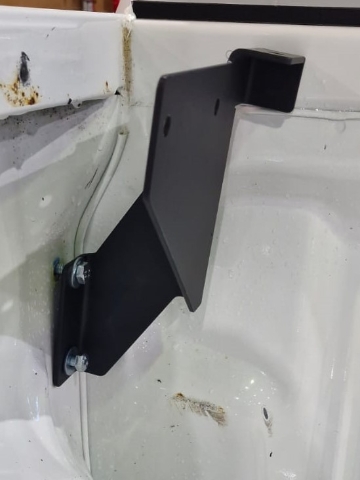 <p>Install the front brackets to the front tie-down points. Dont use the tie down point to tighten it.</p>