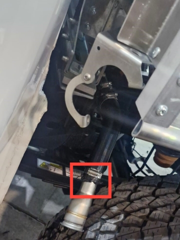 <p>Urethane around the fuel filler and hose.</p>