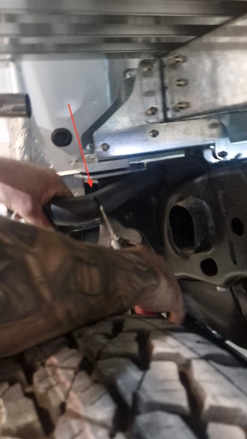<p>Cut the original fuel hose at the bend as shown.</p>