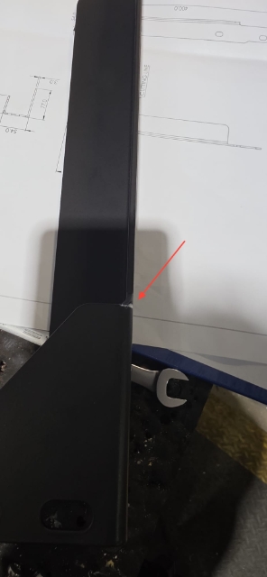 <p>The left rear bracket will need to be cut where the mark is.</p>