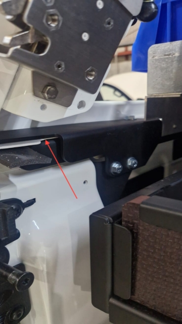 <p>Fit the rear canopy bracket so that it sits over the top of the canopy side rail, ensuring correct alignment as illustrated.</p>