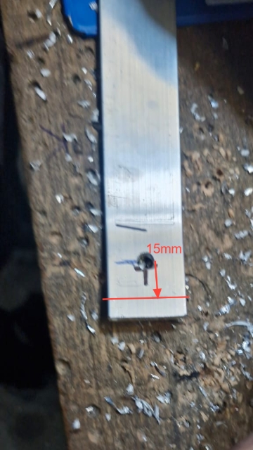 <p>Measure 15mm from the middle of the hole to the end and make a mark to cut.</p>