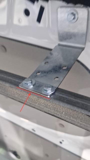 <p>Bolt the bracket to the versi framing. Ensure that the excess of the bracket is cut of where the red line is shown.</p>