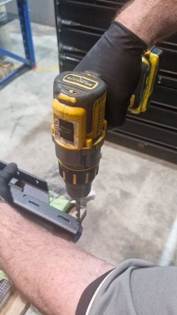 <p>Use an 8.5 mm drill bit to drill the end out the end of the roof tray.</p>