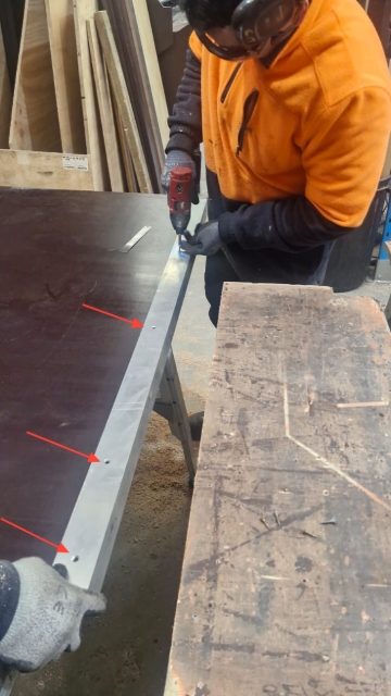 <p>Screw the second angled alloy piece once it has been cut back to the plywood.</p>