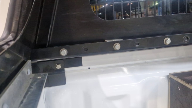 <p>Use M8 x 20 Hex Heads with M8 flat washers and M8 Nyloc nuts to tighten the the cargo barrier together.</p>