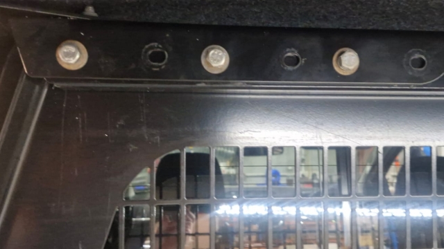 <p>Do the same as the step above with attaching the cargo barrier together.</p>