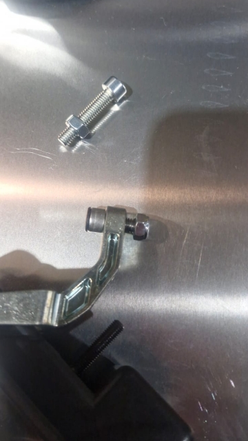 <p>Take the original pin out and put the new pin in with an M6 bolt on the bottom to the new pin.</p>