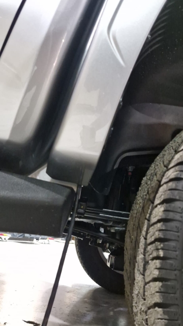 <p>Run the wire along the chassis ensure it sits along the top so it can't drag on the ground.</p>