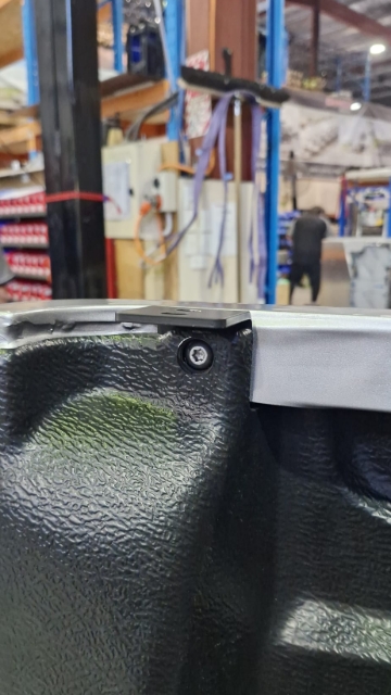 <p>Use the original factory hardware to fit the rear brackets. Ensure these are tightened to hand-tight before final alignment.</p>