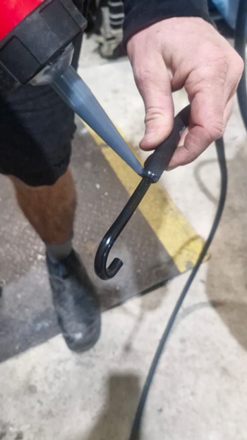 <p>Urethane the breather to the hose.</p>