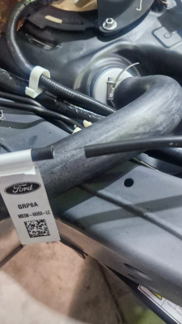 <p>Cut the fuel breathers before the tag.</p>