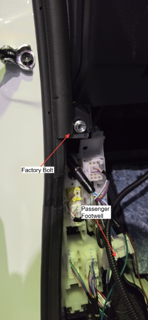 <p><span style="color: rgb(37, 37, 37); font-size: 22px; line-height: 1.4;">Remove the factory bolt from the passenger side above the wiring block.</span></p>