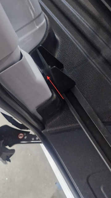 <p>Fit the bracket and low pro bar to the original tie-down points. Ensuring the spacer is behind the bracket</p>