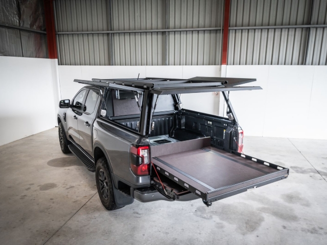 <p>Lift the Roll-A-Table in to the wellside of the vehicle with atleast 4 guys carefully to prevent damage</p>