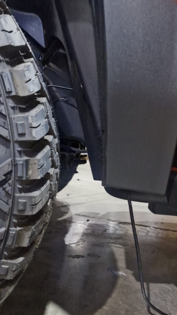 <p>Pull the loom out under the wheel arch.</p>