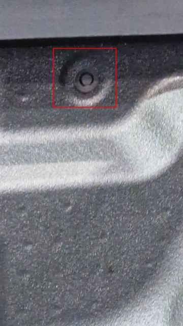 <p>Remove this grommet from the right-hand side of the wellside.</p>